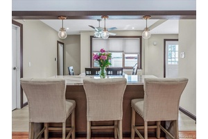 Welcome to 219 08 38th Avenue, a beautifully updated 4 bedroom, 2.