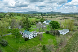 Discover a rare opportunity to own a remarkable 127 acre residential farm that straddles the charming towns of North East and Amenia in New York's picturesque Hudson Valley.