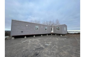 This luxurious resort cottage model is exclusively designed for our 10 month lots with beautiful views of Rice Lake.