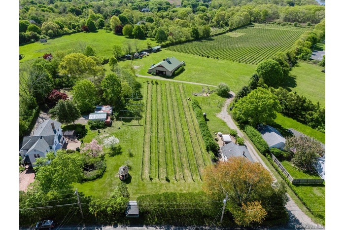 Well maintained 1858 Farm House and extra large barn with 17.5 acres of farmland - boutique vineyard