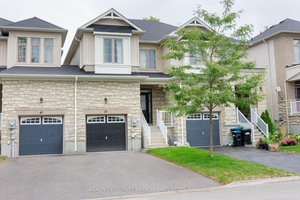 Welcome to 47 Greenwood Drive, Angus An Executive Town home Like No Other !