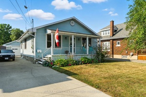 Welcome to this charming bungalow, perfectly blending comfort, functionality, and curb appeal.