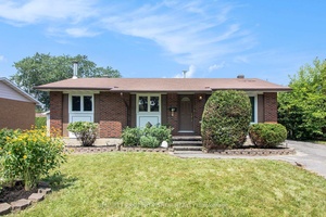 This spacious all brick bungalow is centrally located in the family friendly Queenwood Heights neighbourhood within walking distance to schools.