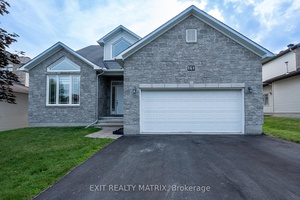 OPEN HOUSE ON SUNDAY, AUGUST 31st FROM 2PM 4PM From the outside, this home stuns with its grand fac ade appearing like a two storey but offering the rare convenience ...
