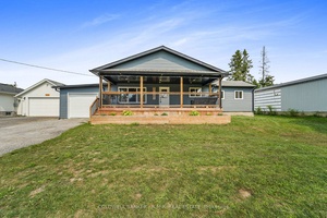 Welcome to this beautifully updated 3 bedroom, 1 bathroom bungalow that perfectly combines modern living with comfort.