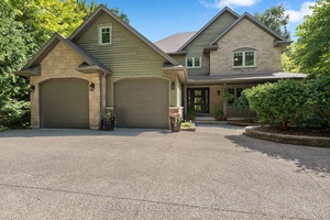 Welcome to 200 Trillium Drive, a custom built home nestled on a stunning, private lot in one of Port Elgins most coveted neighbourhoods.