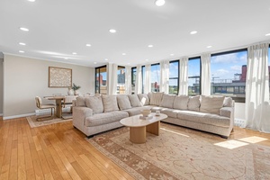 Experience luxury living in this top floor, eastern exposure with bridge and water views from each room.