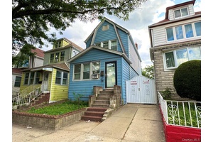 Investor special. Fully detached single family home with private driveway located in the heart of East Elmhurst.