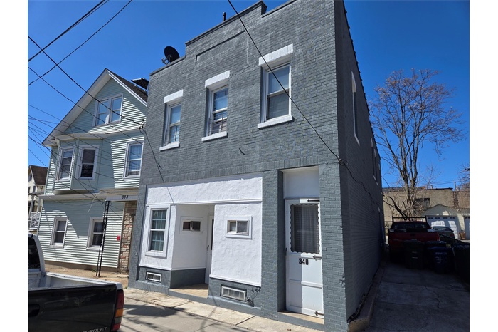 View of front of property with brick siding