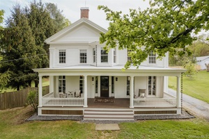 This handsome Greek Revival sits on a quiet street occupying a generous village lot in the historic Hamlet of Hillsdale.