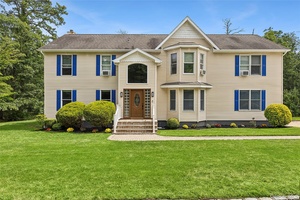 Come home to this spacious Colonial Contemporary Style Home.