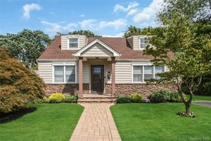 This beautifully maintained Expanded Cape sits on a professionally landscaped 7, 810 square foot lot.
