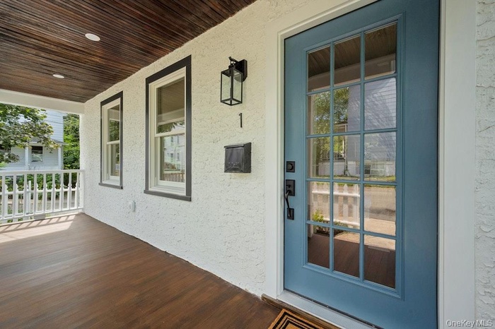 Newly remodeled front porch with custom lighting
