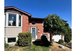Looking for a spacious family home with a great yard and privacy ?