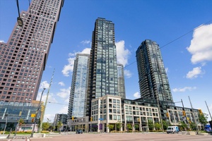 Furnished Sunning 1 Bedroom den unit with 2 bathrooms and massive east facing floor to ceiling windows.