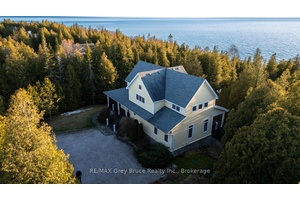 Listen to birdsong and breathe in the soft, cool scent of cedar as you follow a flagstone path to the ocean like expanse of Lake Huron.