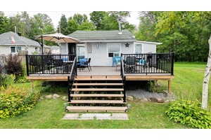 A true turn key opportunity on beautiful Stoco Lake this property offers not one, but two fully updated cottages with shared waterfront and docking.