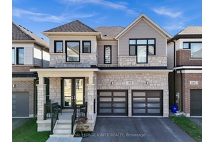 Discover this beautifully upgraded family home perched above the neighborhood, offering unobstructed views of Hamilton Airport.