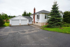 LARGE DOUBLE WIDE LOT 120 FEET X 175 FEET BACKING ONTO PROTECTED CONSERVATION LAND !