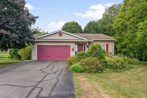 Nestled on a private lot backing onto peaceful farmers fields, this delightful home offers the perfect blend of comfort and tranquility.
