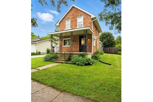 Excellent East side 1. 5 story home with detached garage and a 185 foot deep lot.