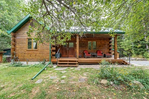 Escape to nature with this stunning 2 1 bedroom custom log home, set on 6.