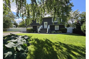 Welcome to this well maintained 5 BR, 3 full bath home offering exceptional space and versatility.
