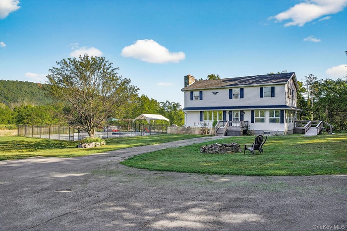 View of front of house with a chimney