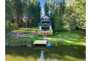 Imagine coming home to this Lake Front Oasis.
