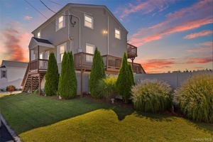 Beautiful Elevated Colonial with Bay Views !