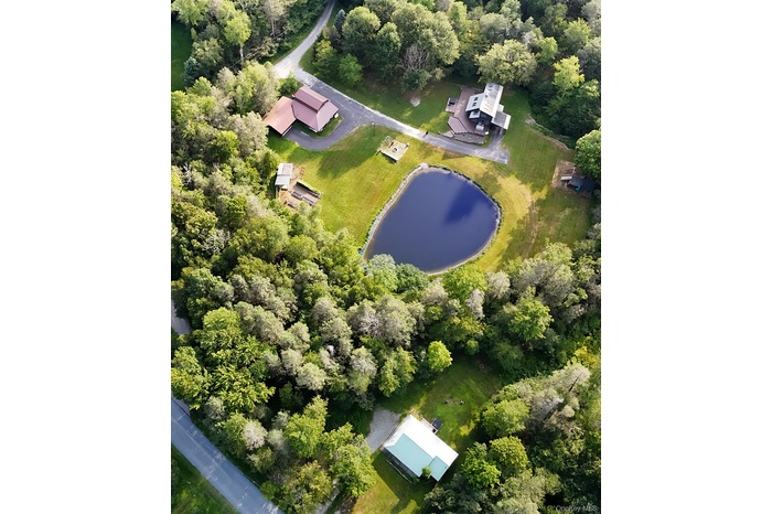Aerial view of property - Main House, Barn and guest house.
