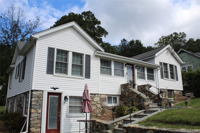 View of front of home featuring stone siding