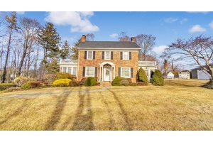 This Brick home is filled with charm on a large property, offering an unbeatable convenient walkable location near restaurants and shopping, beach, public school, and transportation.