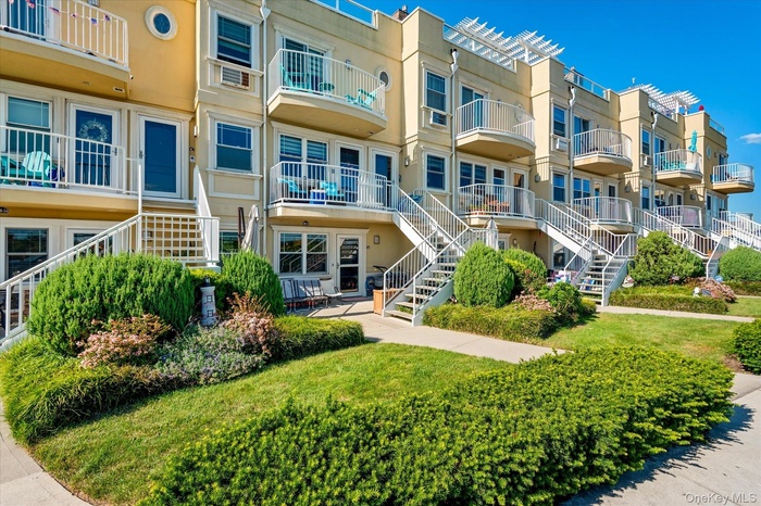 View of building exterior featuring stairway