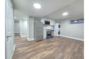 New, Elegant and legal, architect designed 1 Bedroom Den apartment has an open concept design.