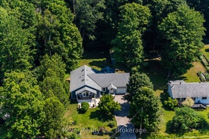 Discover the perfect blend of comfort and convenience in this beautifully updated 2 bedroom plus den, four season home or cottage located in Thunder Beach.