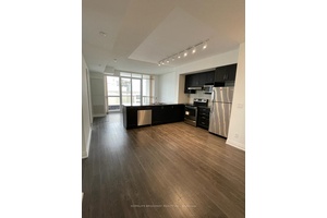 Bright and spacious 2 1 with 2 bathrooms corner unit featuring a practical split bedroom floor plan, open concept living and dining area, and modern kitchen with granite counters and ...