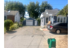 Welcome to 4557 Lee Ave This charming home offers the perfect blend of style, comfort, and functionality.