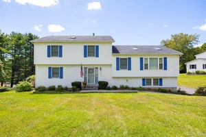 Impeccably maintained 3 bedroom, 3 bathroom split level with attractive and flexible floor plan.