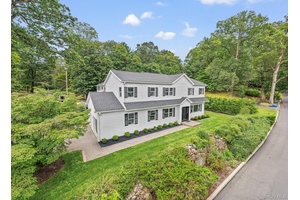 Welcome to this inviting 4 bedroom, 3 bath center hall colonial that blends classic design with everyday comfort.