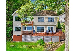 LAKEFRONT retreat on Serene Whaley Lake Welcome to your dream escape on the tranquil waters of Whaley Lake a breathtaking lakefront property offering panoramic water views from every room.