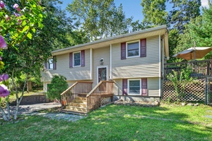 Welcome home to this wonderful, bright and open floor plan with a spacious living area, 3 bedrooms, 2 full bathrooms, den, garage and many updates !