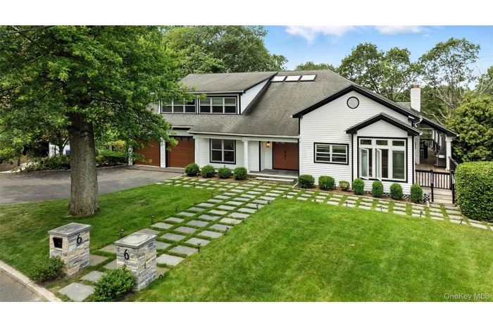 Welcome to 6 Eaton Lane, Scarsdale (Edgemont School District). Spectacular contemporary set on nearly half acre of private property