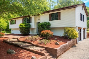 There is nothing typical about this raised ranch and all that it offers.