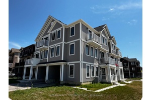 Welcome to this Beautifully Maintained Corner Unit Offering Approximately 1, 600 SQ FT of Space.