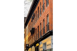 Welcome to 203 King Street East a one of a kind opportunity in downtown Hamilton offering an inspired blend of residential luxury and commercial versatility.