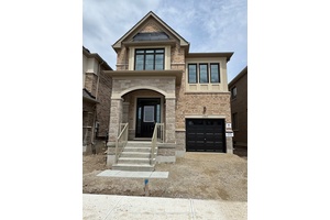 Welcome to this newly built detached home showcasing a bright, functional layout with separate living and family rooms.
