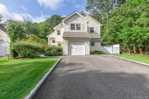 Beautifully updated Woodmist model in the desirable gated community of Strathmore on the Green.