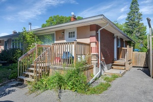 Beautifully Maintained Bungalow with Income Generating In Law Suite in the Heart of the City !