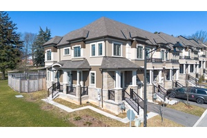 This Stunning Newly Built Executive Freehold Premium End Unit Town Home is Sure to Impress !